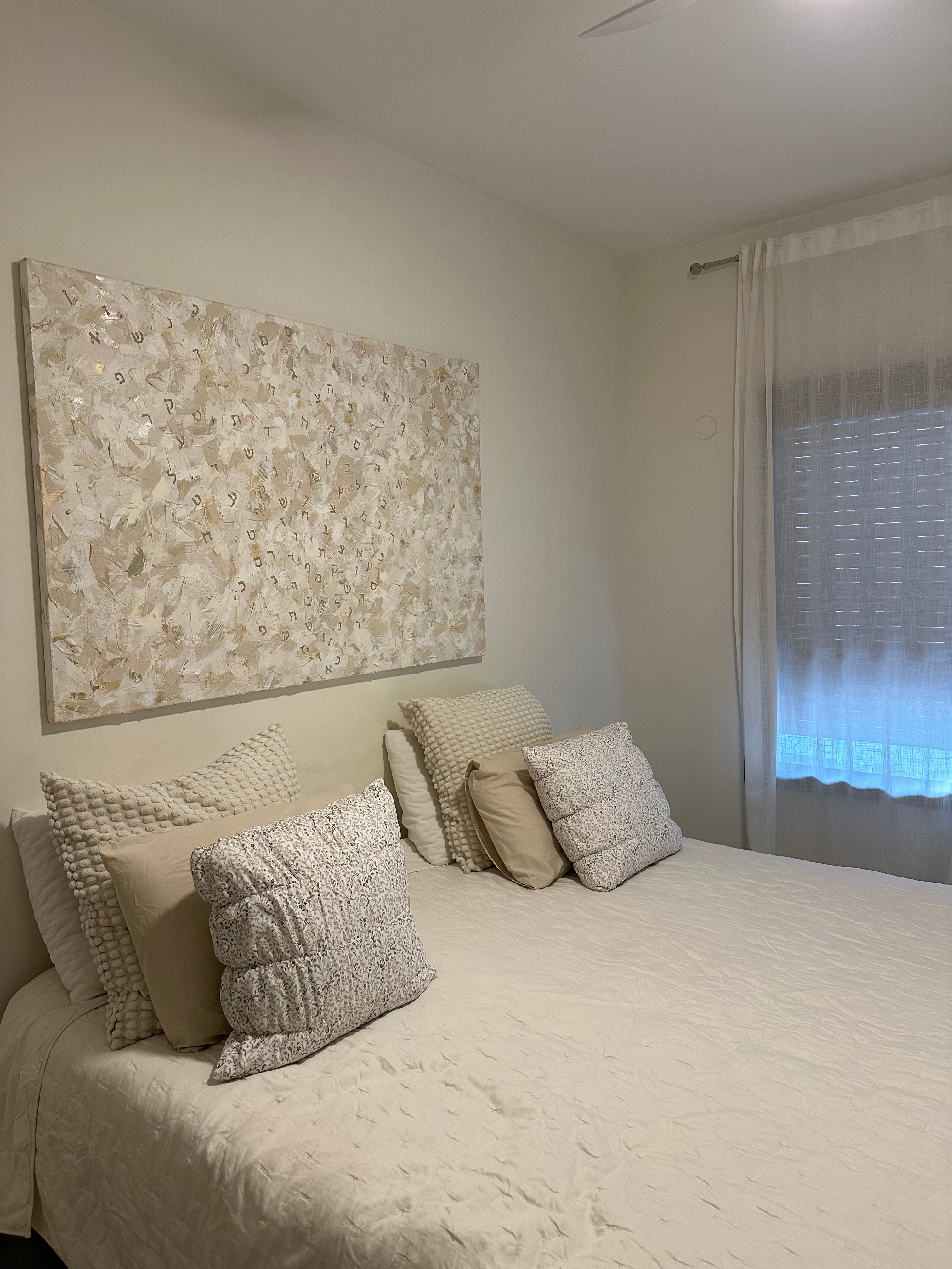 Angled view of Masterpiece — Ivory & Gold, original hand-painted canvas with bold abstract textures by Eli Studio